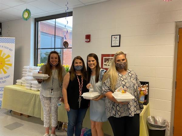 employees enjoying breakfast
